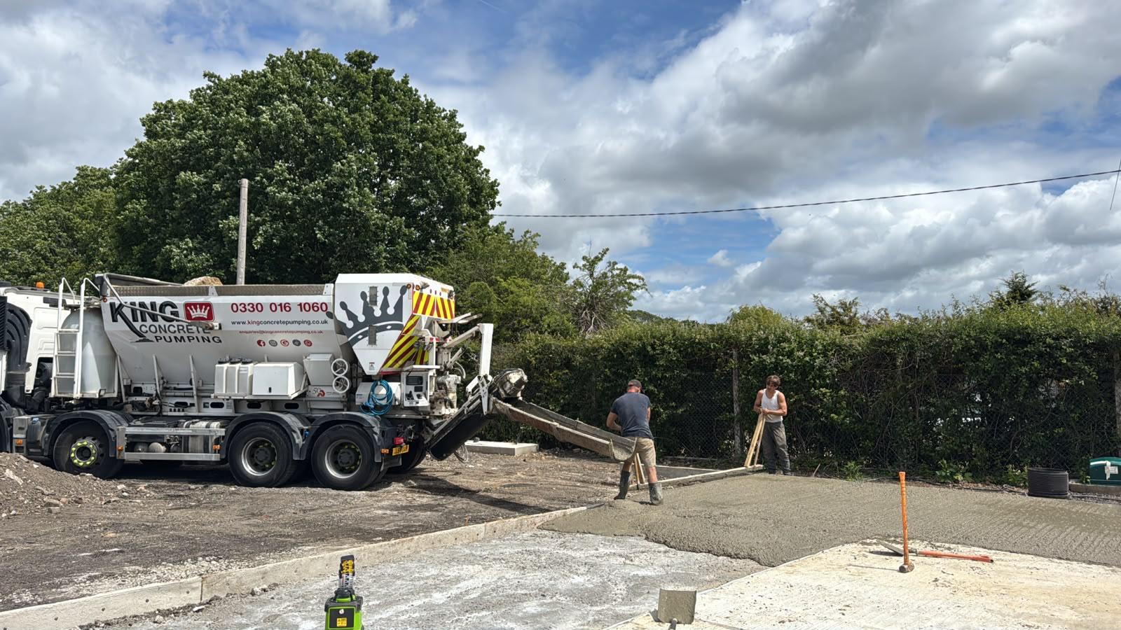 King Concrete Pumping crew placing concrete on a Crawley site